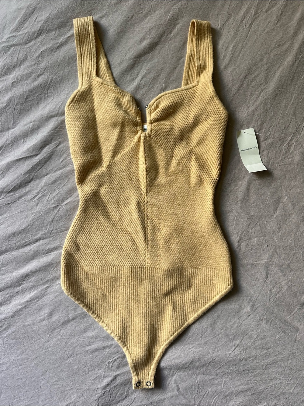 Kids Ribbed One-Piece Knit Bodysuit in Mustard Yellow